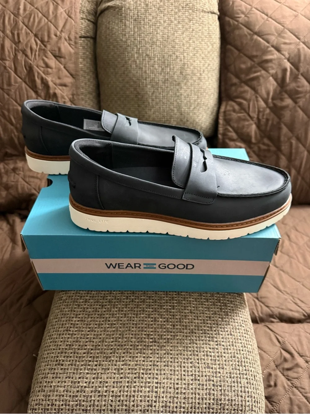TOMS Black Leather Penny Loafers with Tan Welt and White Sole